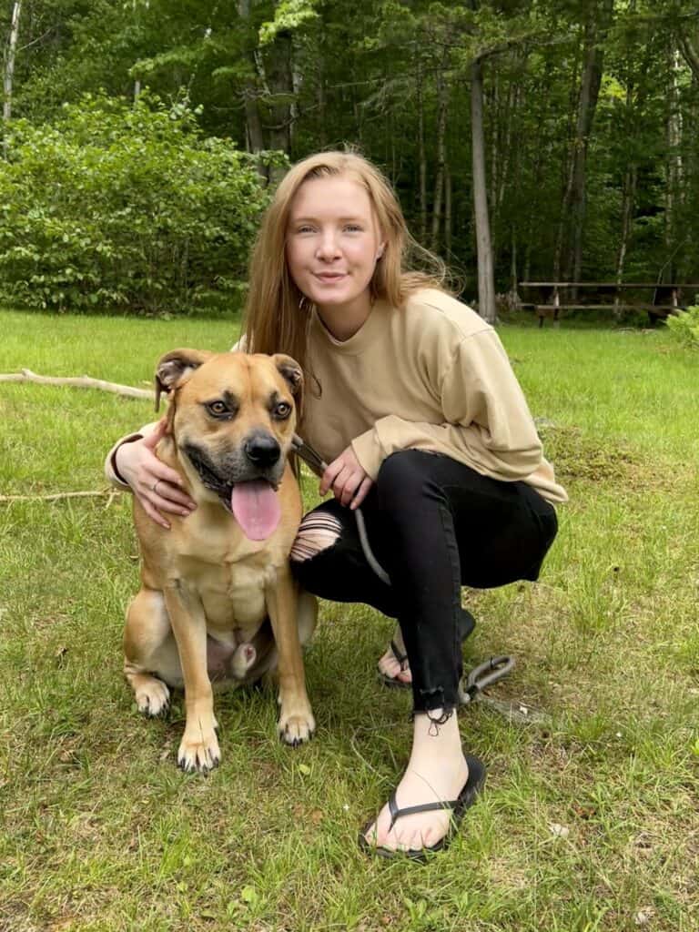 Image of Adele Hall and her dog, Dover.